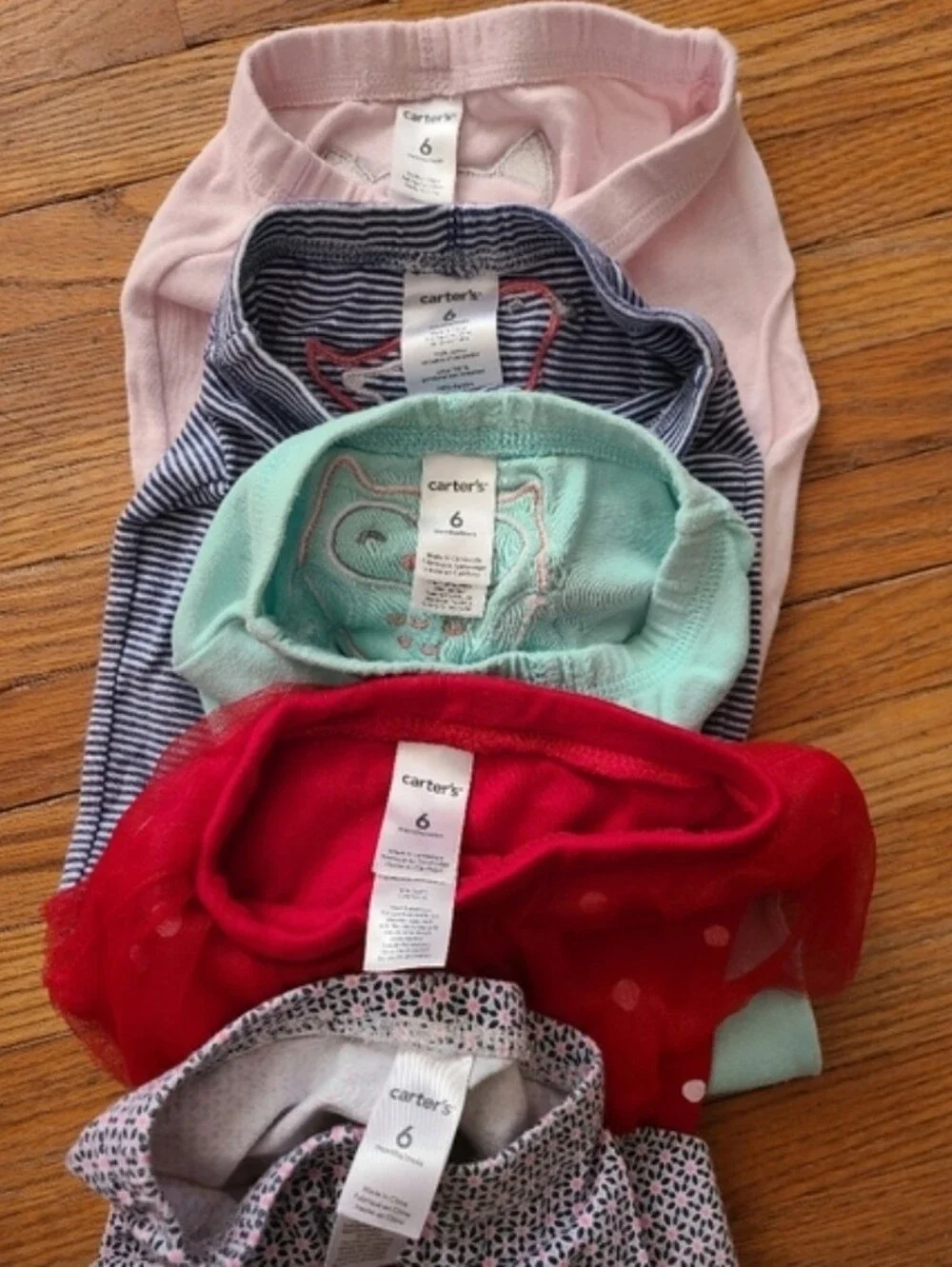 bundle of baby girl bottoms, 6 months